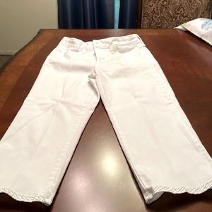 Nydj white capris with silver edging at bottom.